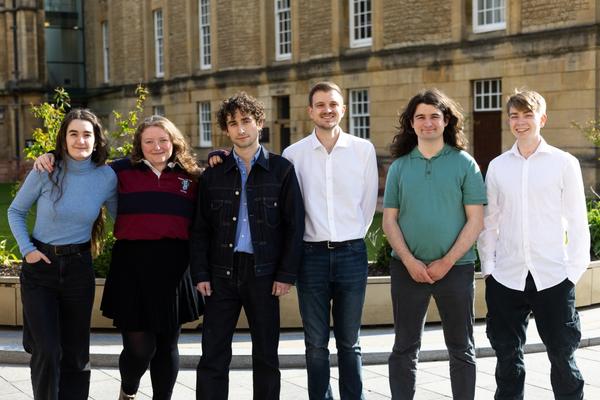 The GCR Executive Committee, six smartly dressed students, standing together